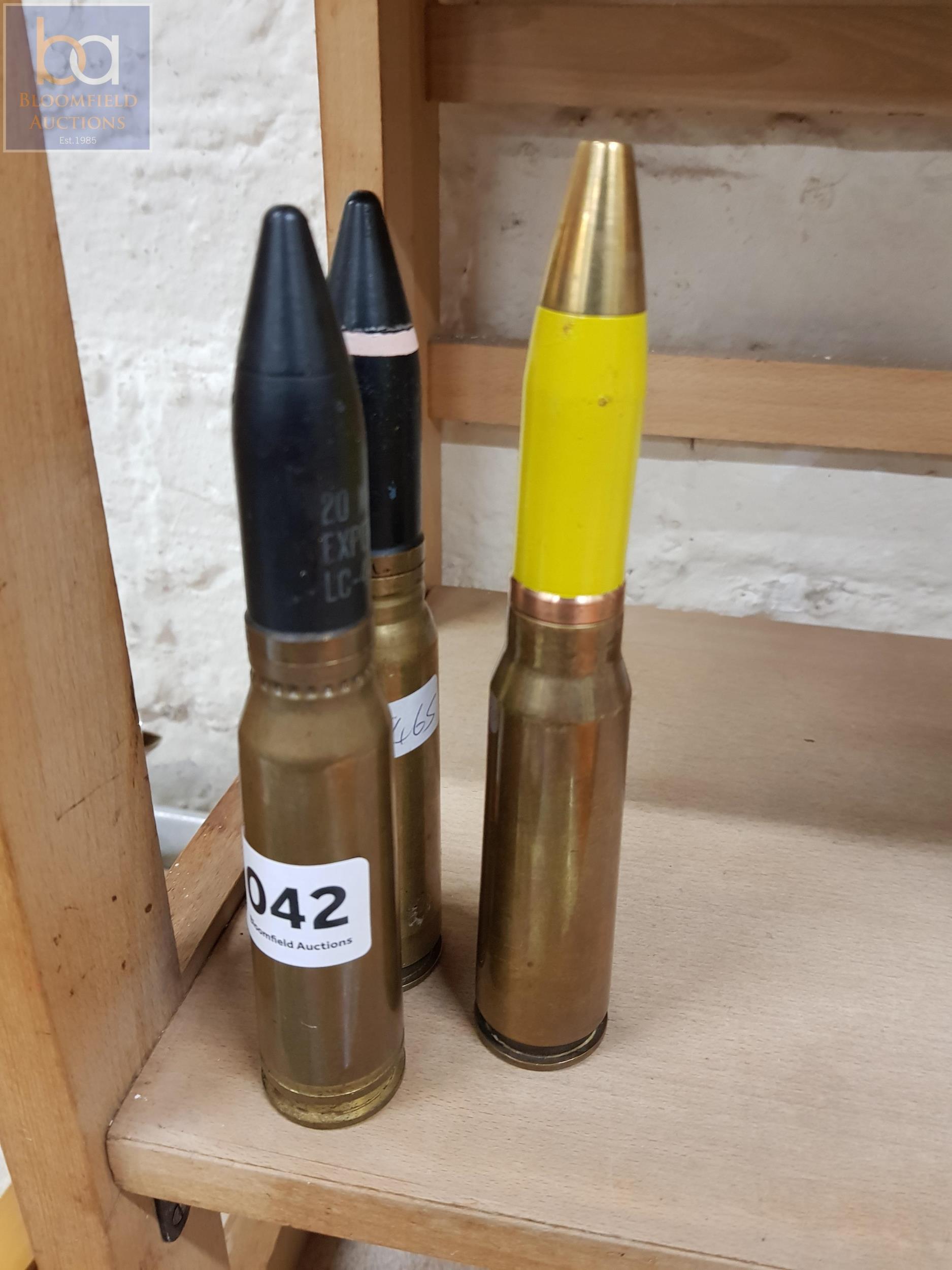 3 LARGE SPENT BULLET SHELLS