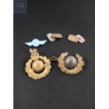 2 MILITARY BADGES AND A PAIR OF GOLD ON SILVER CUFF LINKS