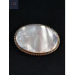 LARGE SILVER AND MOTHER OF PEARL OVAL BROOCH