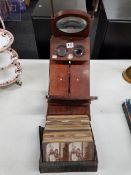 ANTIQUE MAHOGHANY BOWSELLIS GRAPHOSCOPE AND APPROXIMATELY 70 SLIDES