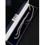 PEARLS WITH 9 CARAT GOLD CLASP AND SAFETY CHAIN