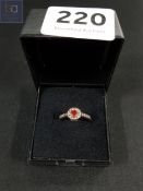 SILVER RUBY AND WHITE SAPPHIRE RING