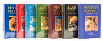 Ɵ ROWLING J.K. [A Full Set of First Deluxe Edition Harry Potter Novels, one SIGNED].1999-2007.