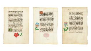 Three leaves from a Book of Hours, each with delicately painted flowers and in one case a jewel