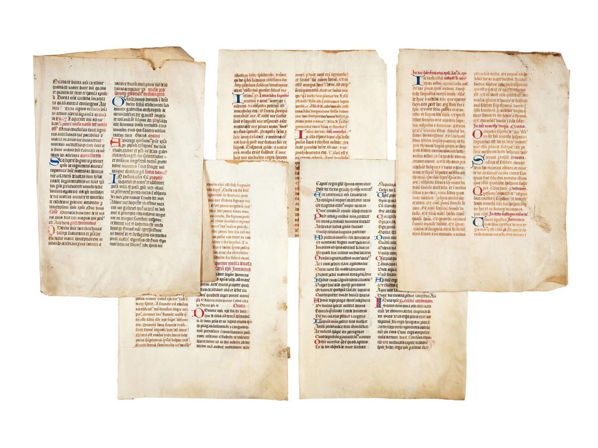 Seven leaves from a Missal, in Latin, decorated manuscript on parchment