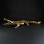 A gilt bronze fountain in the shape of a crocodile