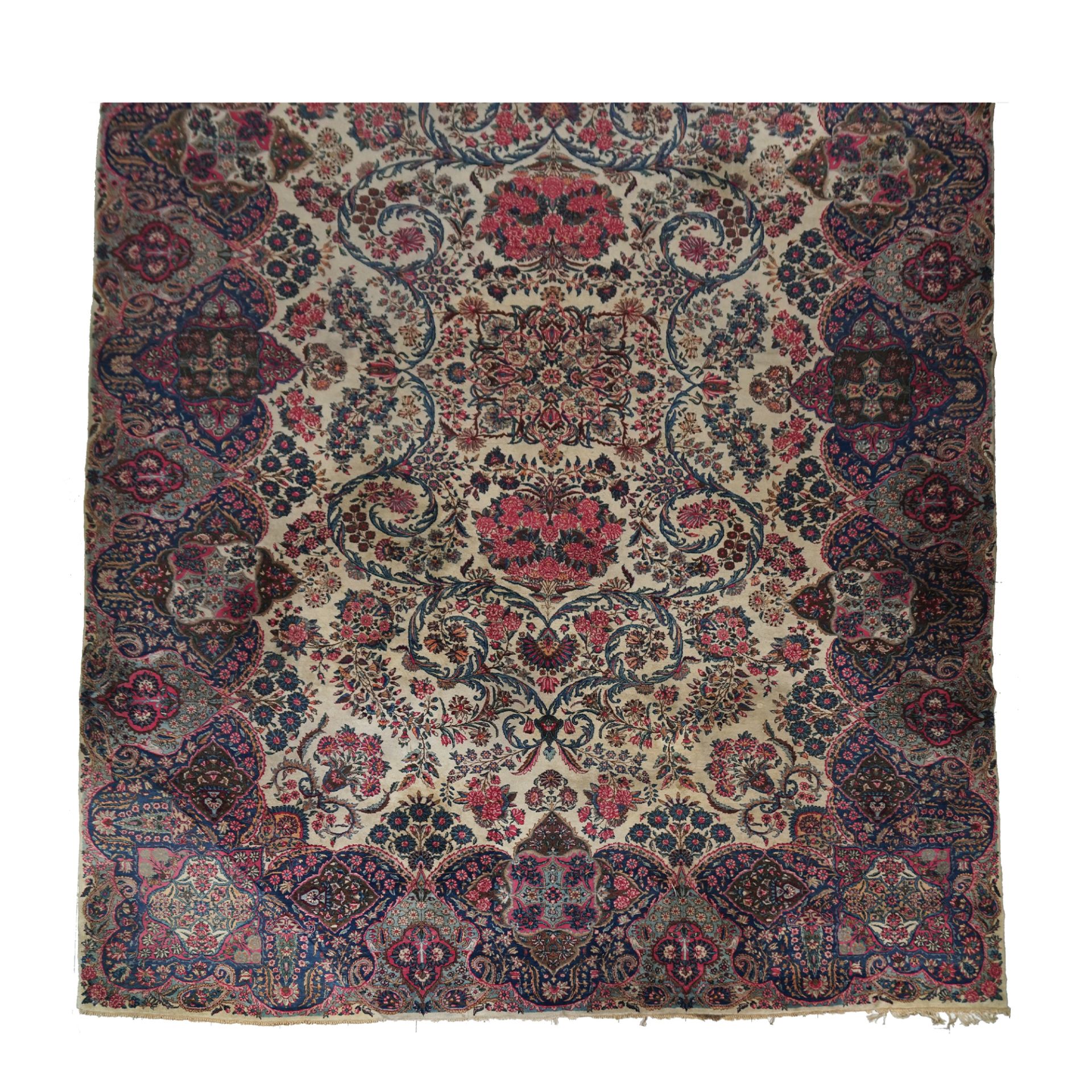 A large Kirman carpet