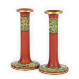 A pair of French gres and polychrome enamel candlesticks, 19th century