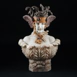 A white and polychrome marbles bust of winged Medusa