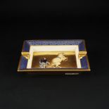 An Hermès gilt and polychrome porcelain Samourai au Dressage ashtray