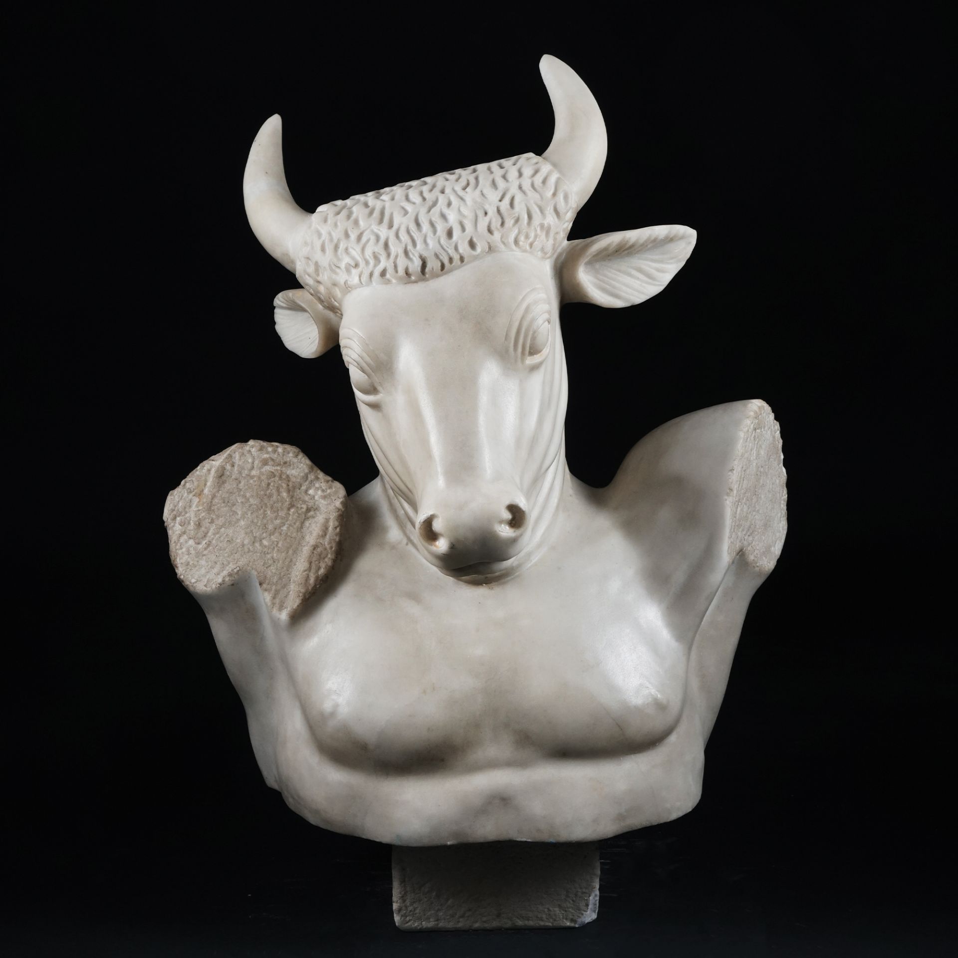 A white marble bust of the Minotaur