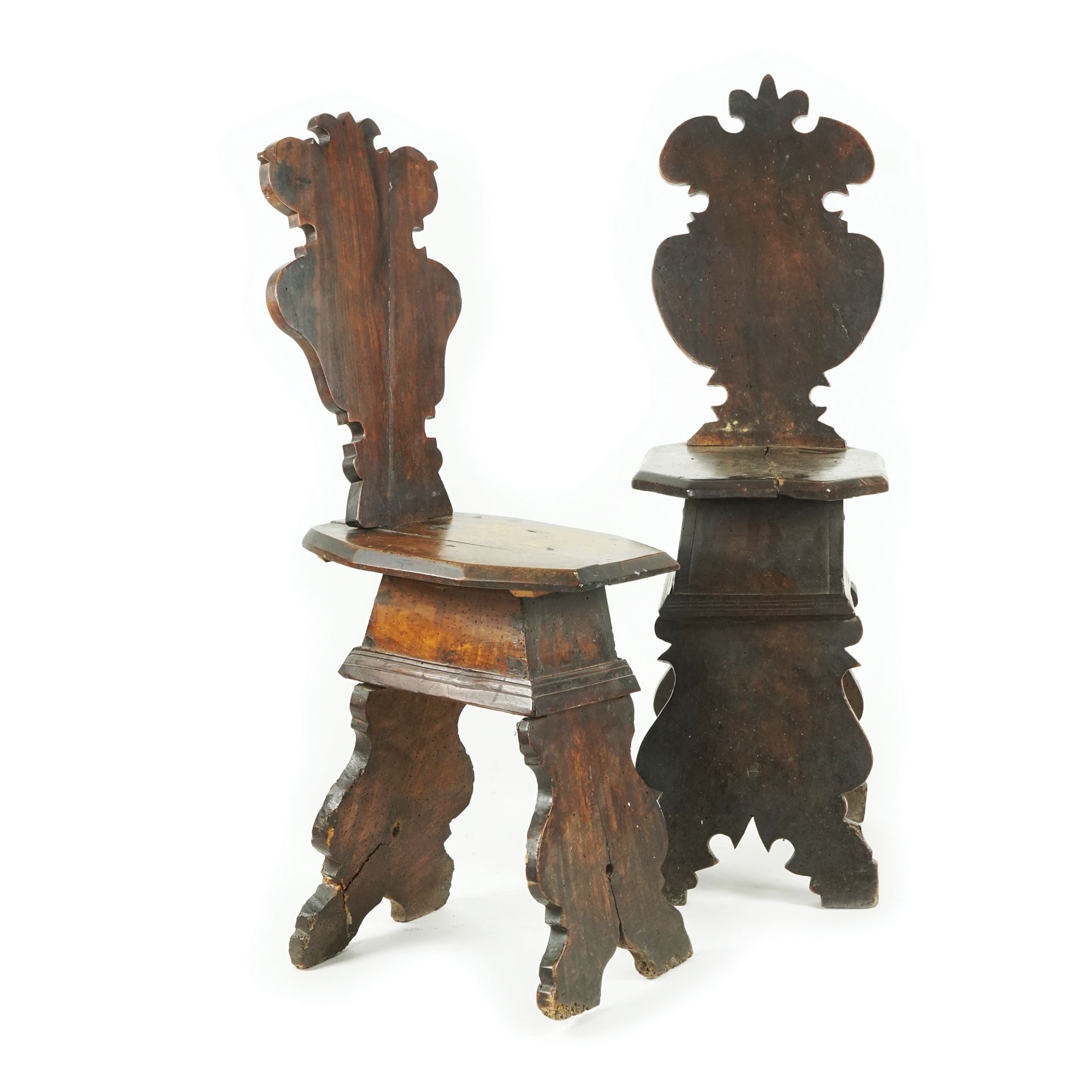 A pair of Umbrian walnut stools, 16th century