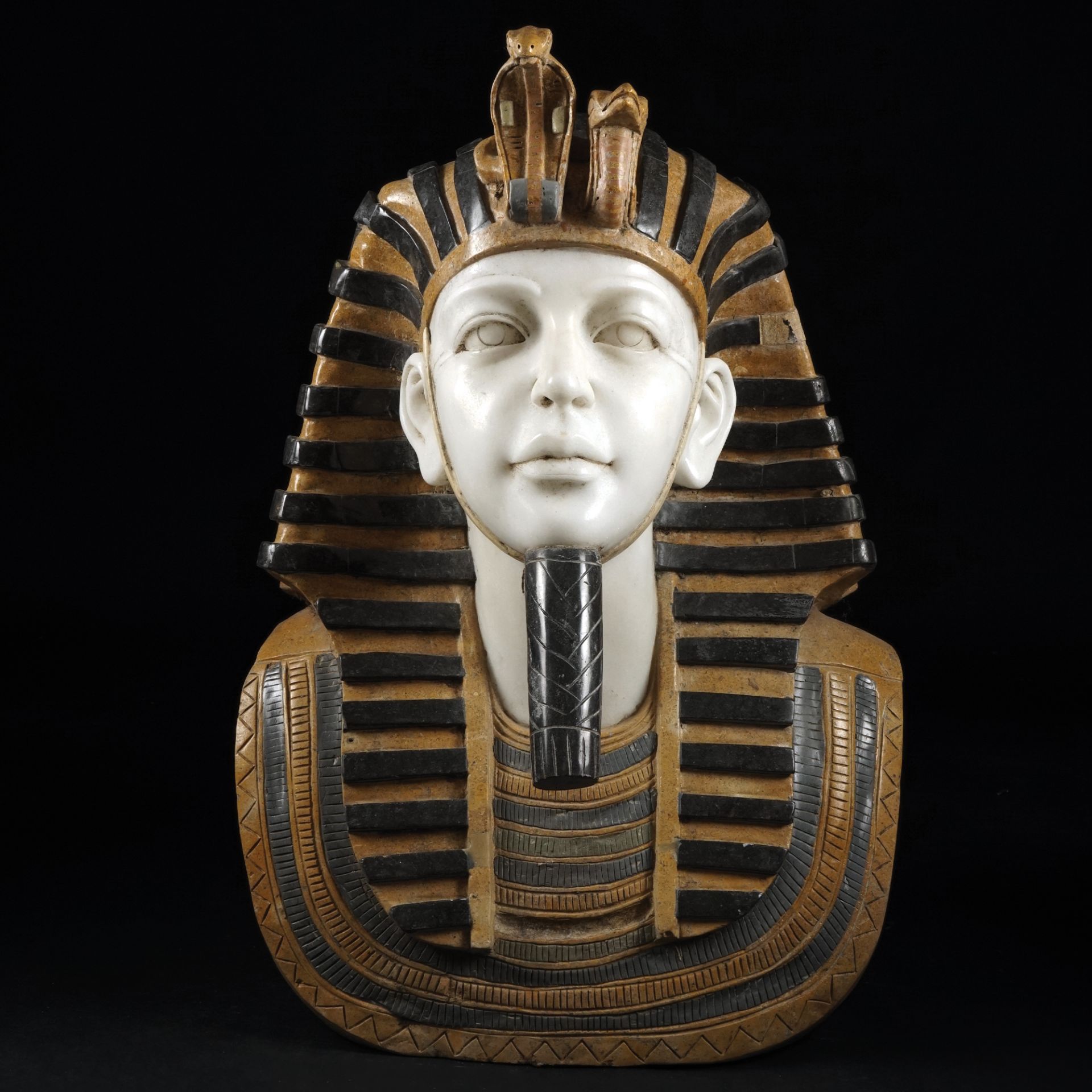 A polychrome marbles bust of a pharaoh