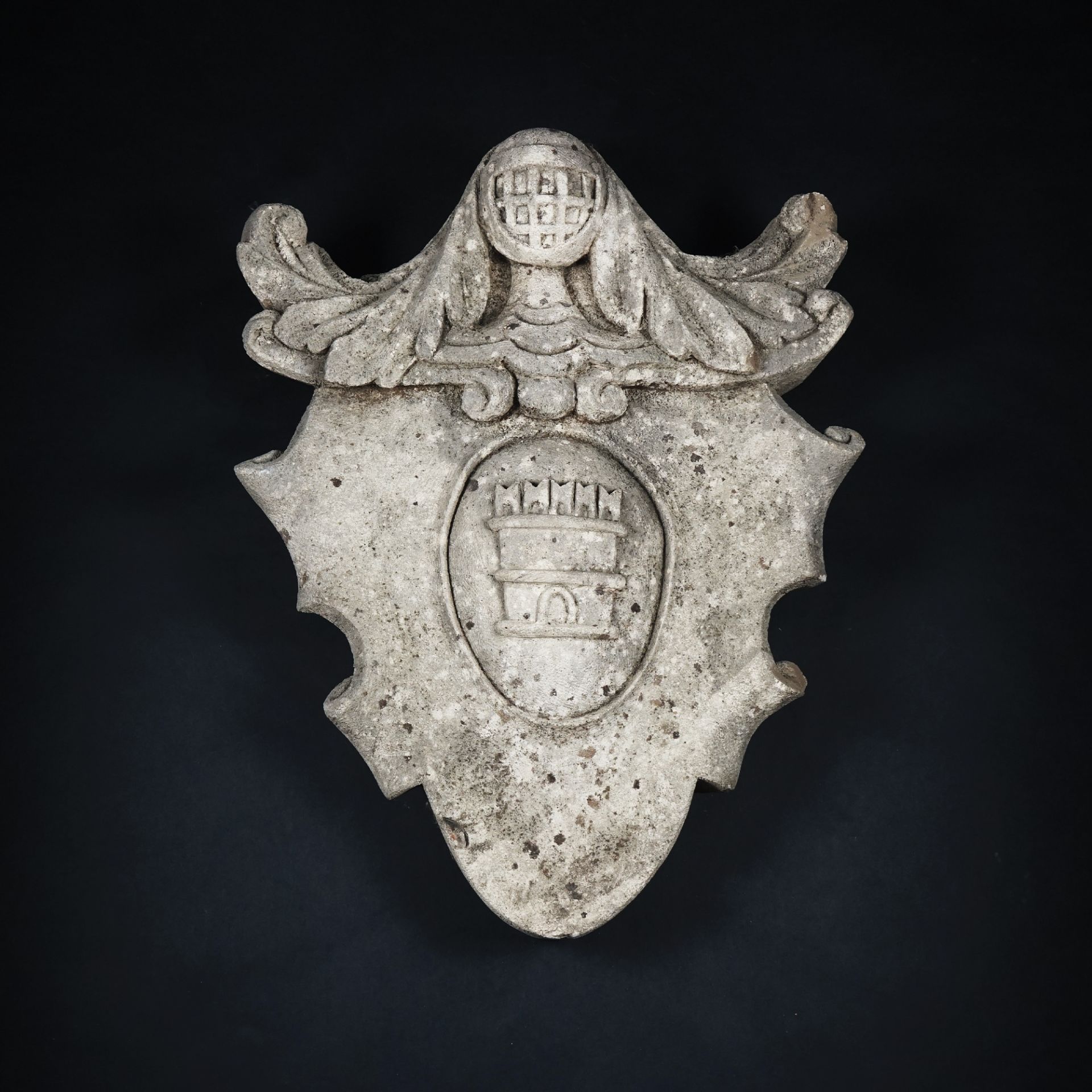 A carved stone coat of arm