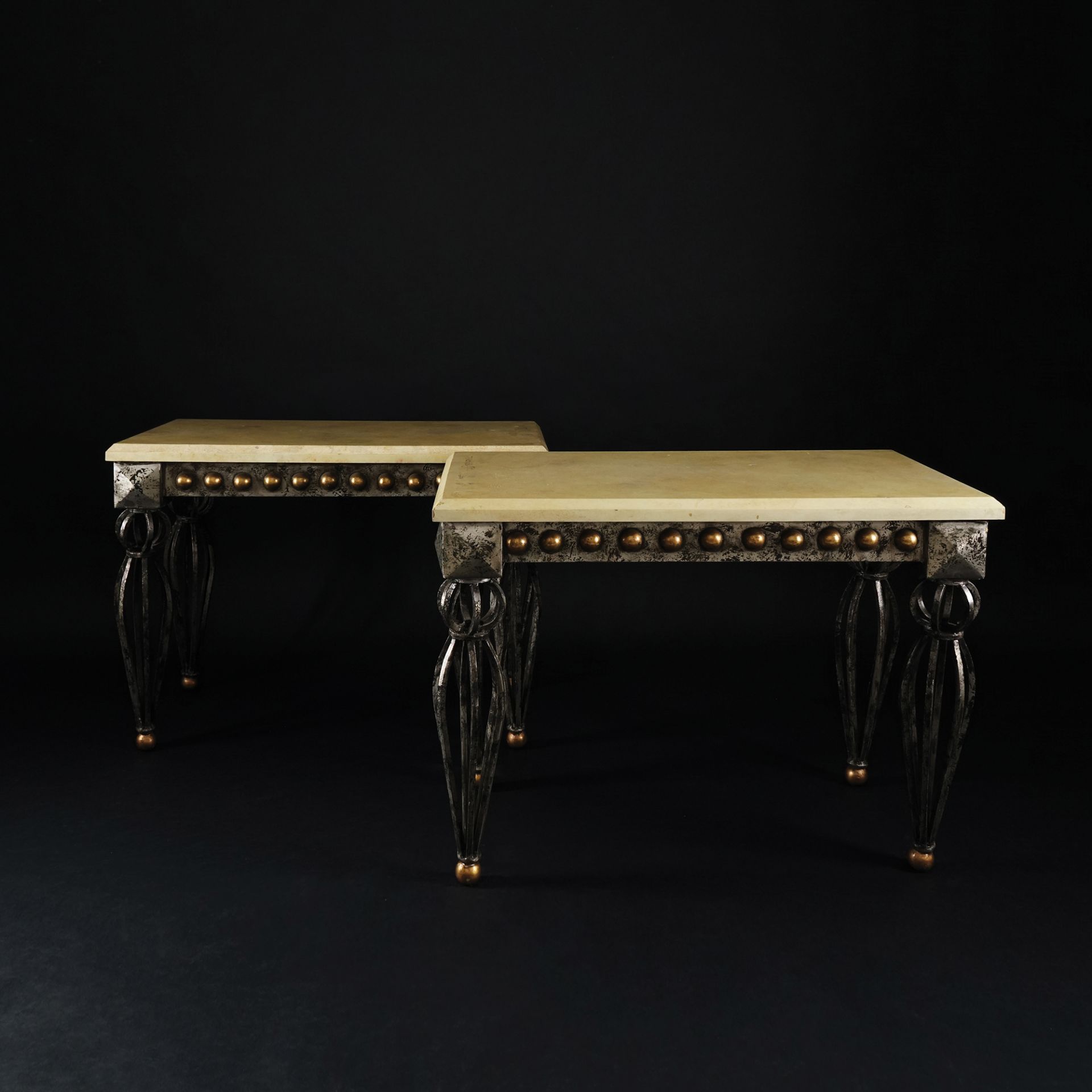 A pair of fake marble wood top sofa tables