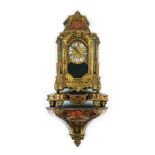 A French gilt metal inlaid ebonized and tortoiseshell spotted motif wood wall mantel clock