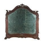 A Venetian carved walnut table mirror
