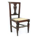 An Umbrian walnut kneeler chair, 18th century