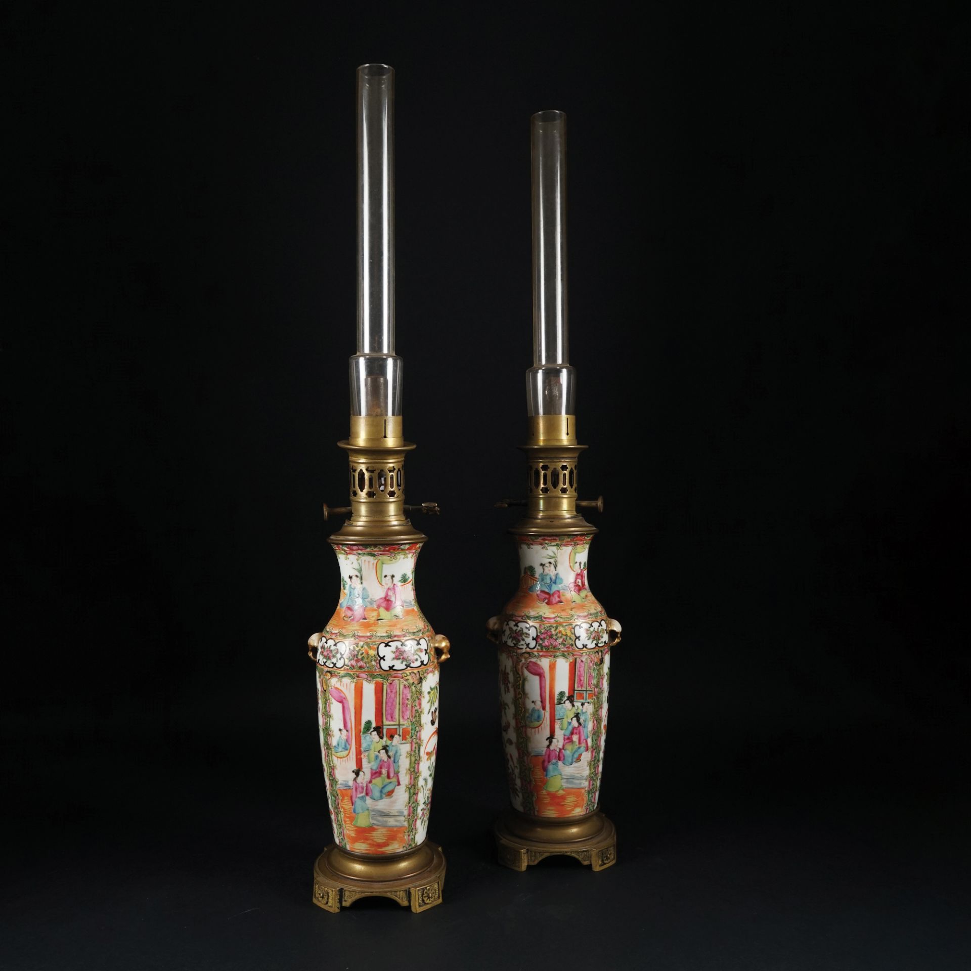 A pair of Chinese lamp mounted polychrome porcelain vases, end of 19th century