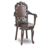 A JAPANESE CARVED HARDWOOD ARMCHAIR Meiji era (1868-1912)