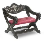 A 19TH CENTURY ITALIAN BONE INLAID EBONY X-FRAMED CHAIR