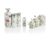 A PAIR OF CANTON FAMILLE ROSE PORCELAIN SLEEVE VASES (7)