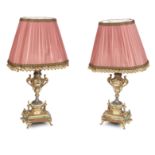 A PAIR OF GILT METAL AND GREEN CHAMPLEVE ENAMEL ONYX MOUNTED TABLE LAMPS 20th century (2)