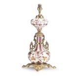 A BOHEMIAN ORMOLU CASED RUBY GLASS TABLE LAMP 19th century
