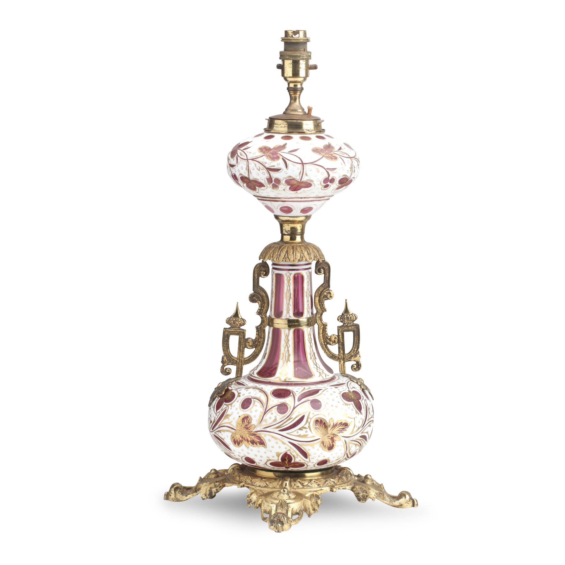 A BOHEMIAN ORMOLU CASED RUBY GLASS TABLE LAMP 19th century