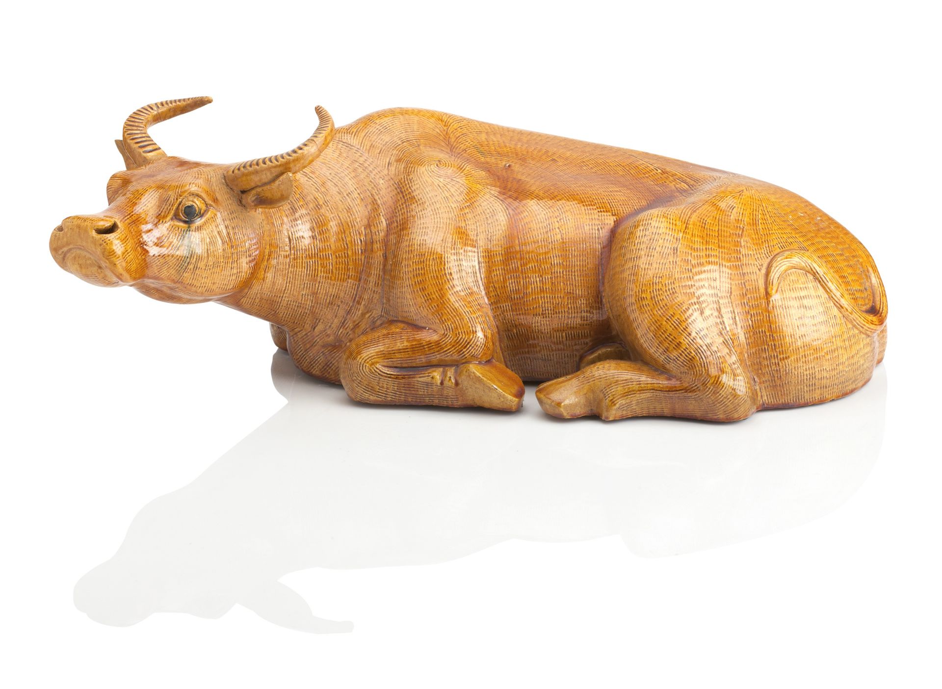 A CHINESE AMBER GLAZED OX Late Qing Dynasty