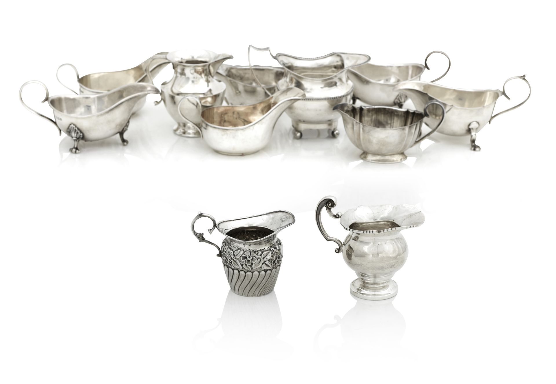 A COLLECTION OF SILVER JUGS AND SAUCEBOATS 20th century, various makers and dates