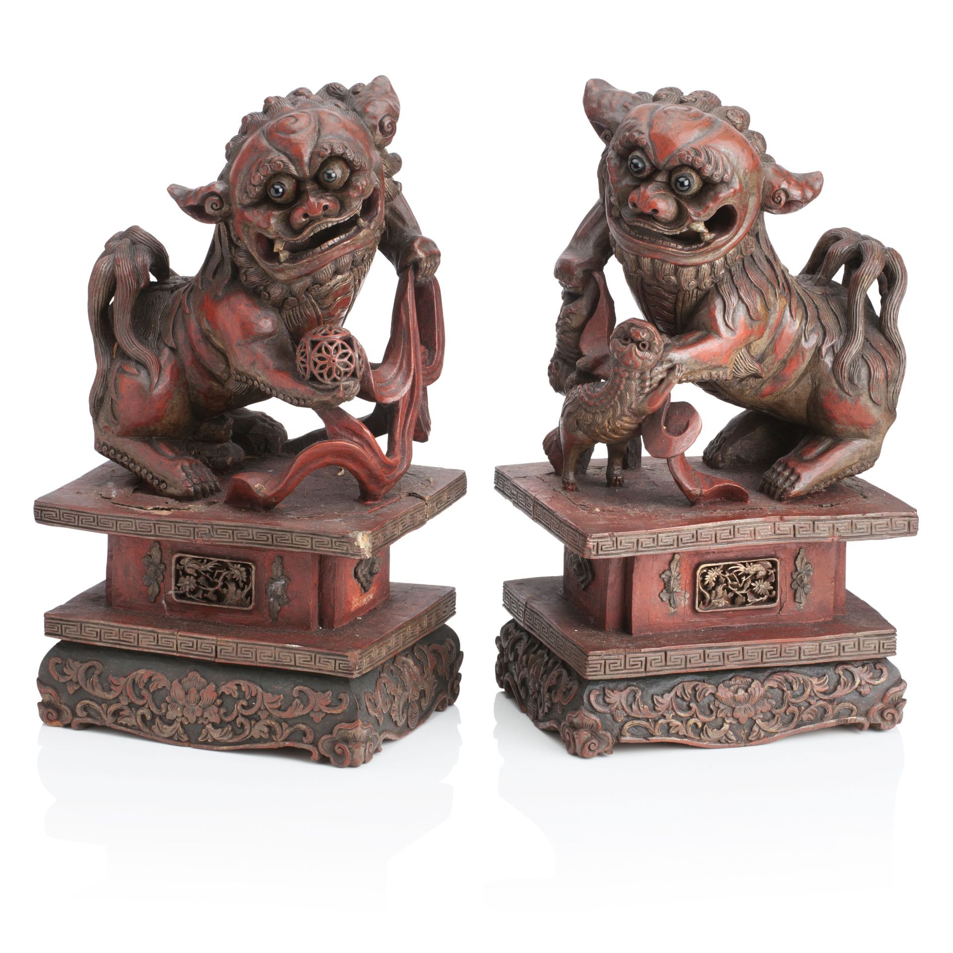 A PAIR OF CHINESE CARVED WOOD AND LACQUER BUDDHIST LION DOGS 19th century (2)