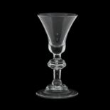 A GEORGE I BALUSTER WINE GLASS Circa 1720