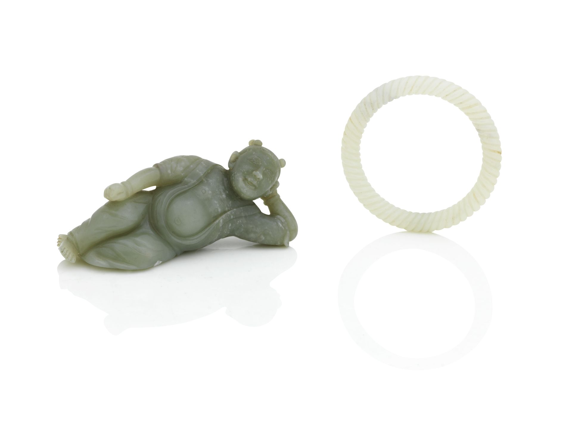 A CELADON JADE FIGURE 18th/19th century (2)