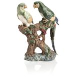 A JAPANESE STONEWARE FIGURE GROUP OF PARROTS Early 20th century