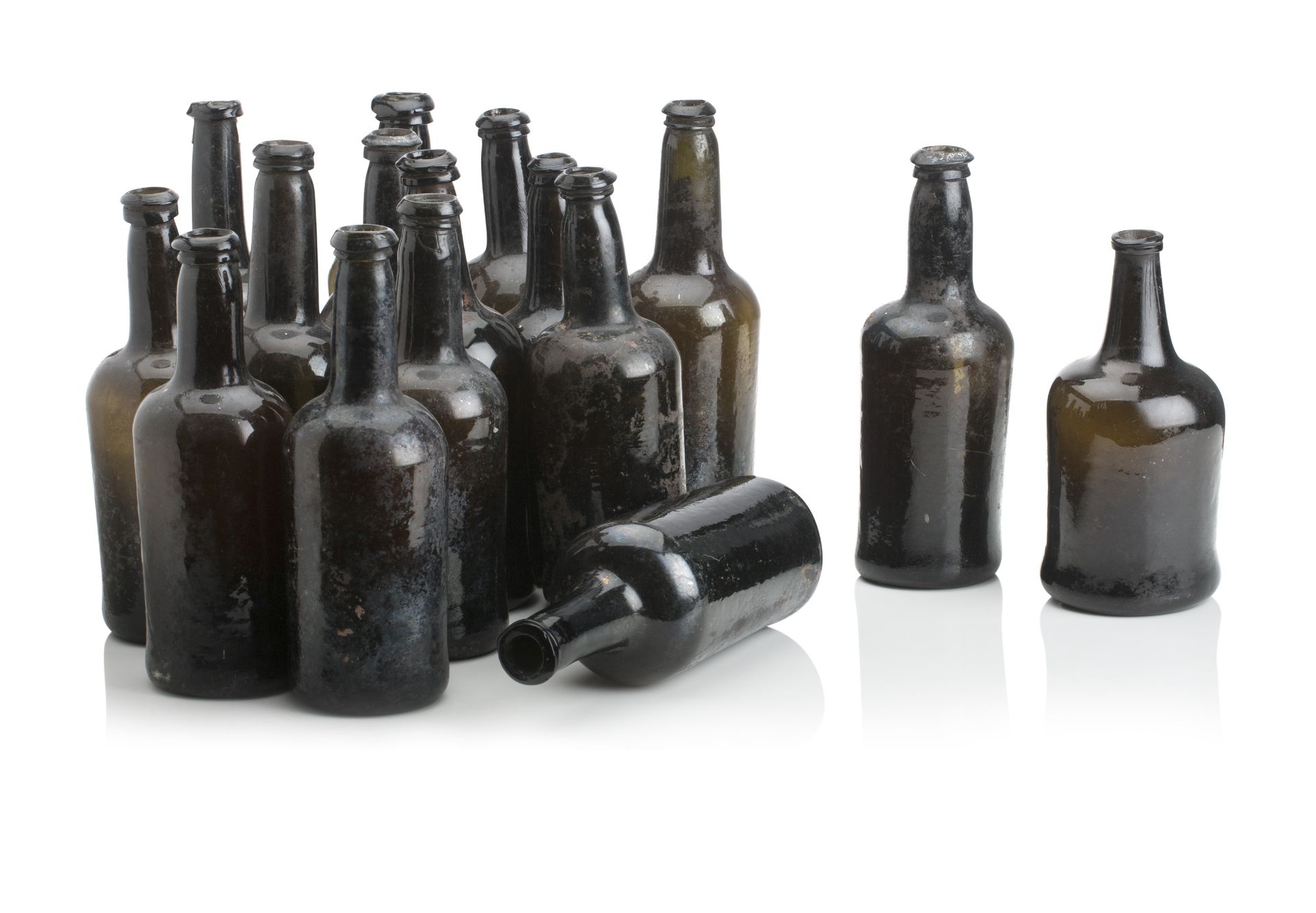 A COLLECTION OF FIFTEEN ENGLISH WINE BOTTLES Late 18th century