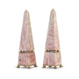 A pair of veined pink marble obelisk garniture in the Empire style (2)