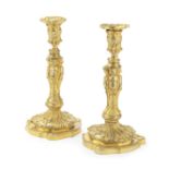 A pair of late 19th century French gilt bronze figural candlesticks in the manner of Juste Aur&#2...