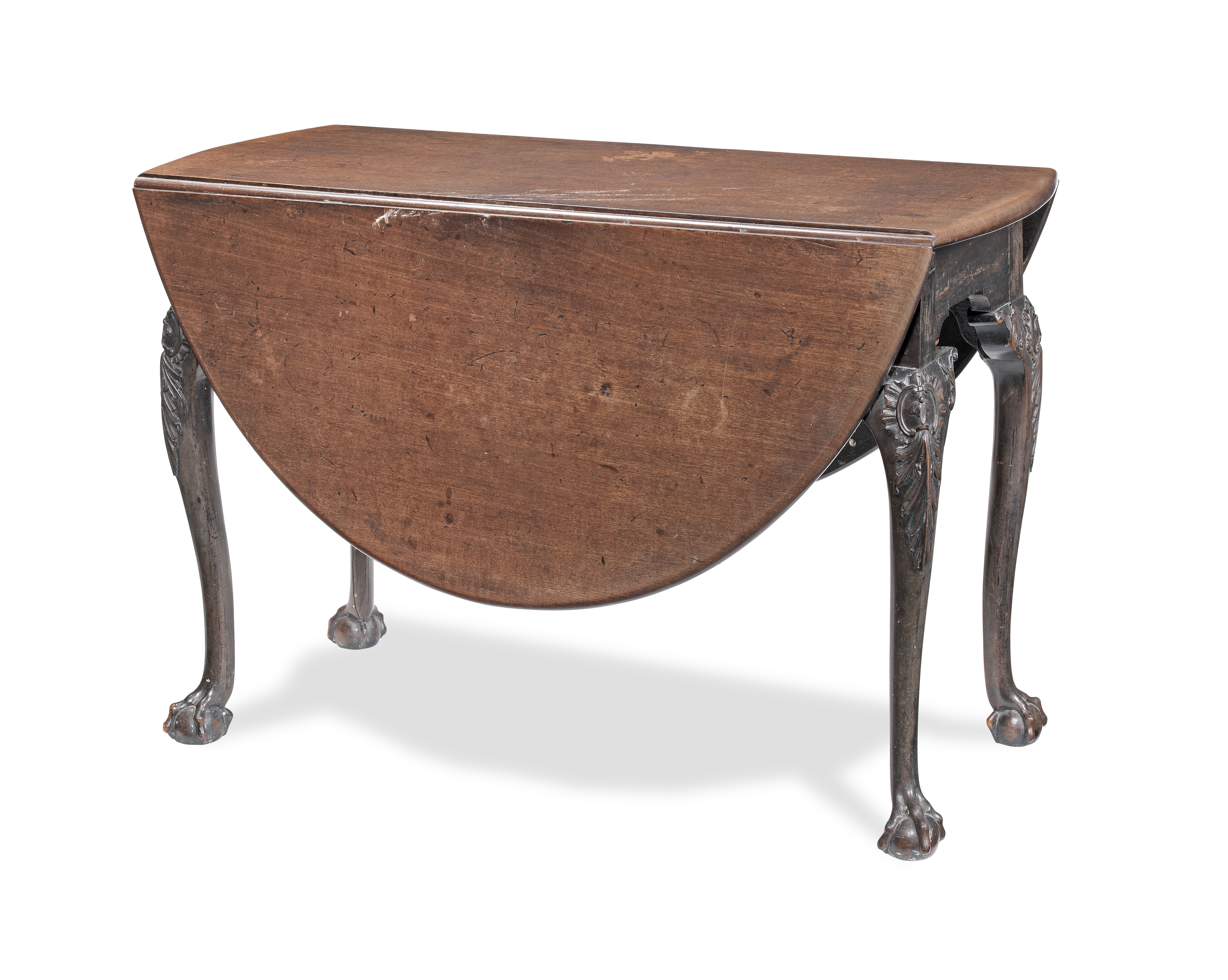 OF COLLECTORS' INTEREST: A late George II carved mahogany drop-leaf table