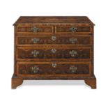 OF COLLECTORS' INTEREST: A William and Mary walnut, oyster veneered and sycamore banded chest