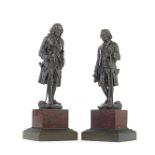 A pair of mid-19th century French patinated bronze figures of Voltaire and Rousseau (2)
