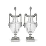 A pair of mid-20th century silvered metal and cut glass urn lamp bases in the Empire style, possi...
