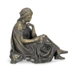 A late 19th century patinated bronze figure of a female muse, probably Euterpe in the Neo-Grec style