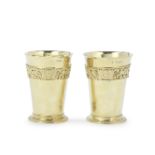 A pair of Victorian silver-gilt beakers Stephen Smith, London 1881