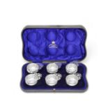 A cased set of six Edwardian silver miniature porringers / tasters Z Barraclough & Sons, London 1909