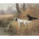 Eugene Petit (French, 1839-1886) Spaniels flushing a woodcock