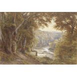 Edmund George Warren (British, 1834-1909) An extensive autumnal landscape with a woman admiring t...