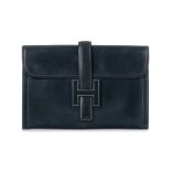 HERM&#200;S: A NAVY BOX LEATHER JIGE CLUTCH 1977