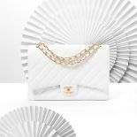 CHANEL: A WHITE CAVIAR MAXI DOUBLE FLAP BAG 2011 (includes serial sticker and dust bag)