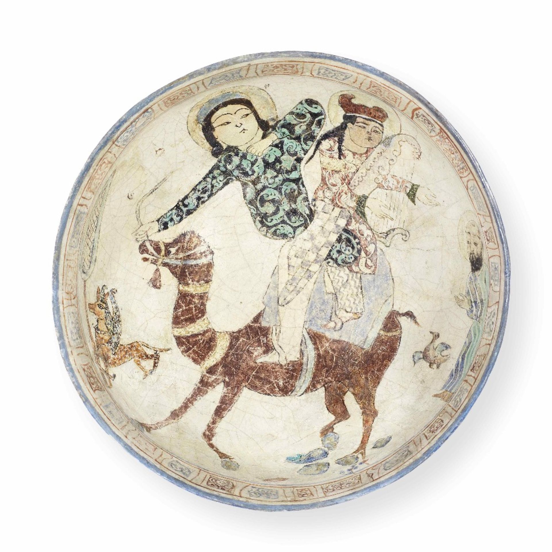 A rare Minai pottery bowl depicting Bahram Gur and Azada Persia, late 12th/ early 13th Century